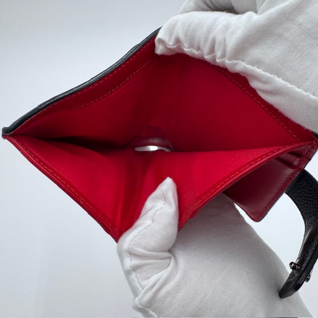 Christian Louboutin Black Leather Wallet with Signature Red Sole Detail