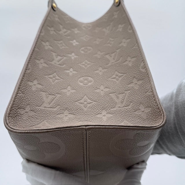 Louis Vuitton OnTheGo MM Empreinte Leather Tote - Turtle Dove