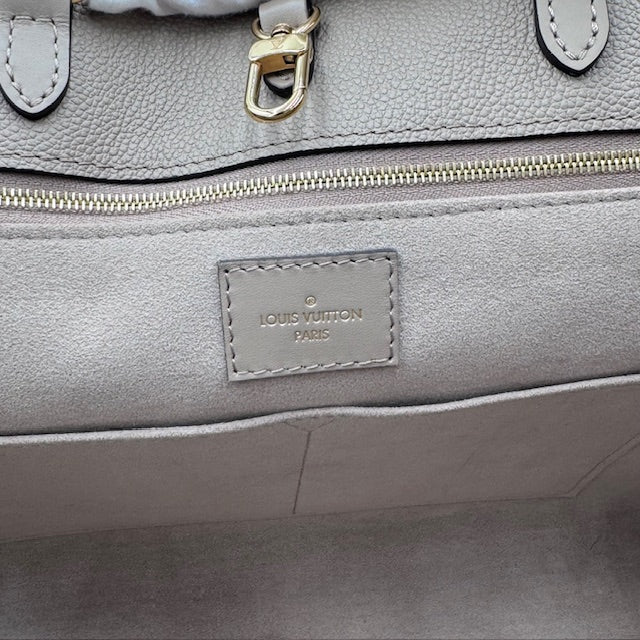 Louis Vuitton OnTheGo MM Empreinte Leather Tote - Turtle Dove
